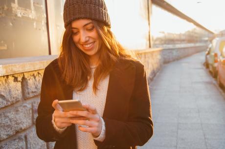 Woman using her mobile device